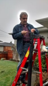 Electrician working on a lamp post